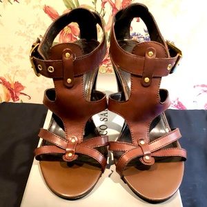 Franco Sarto Ibiza chocolate brown leather sandal with gold hardware.